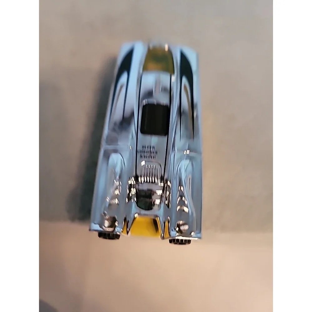 2014 Hot Wheels Silver Chrome Yellow Race Car 1:64 Vetuskey #17